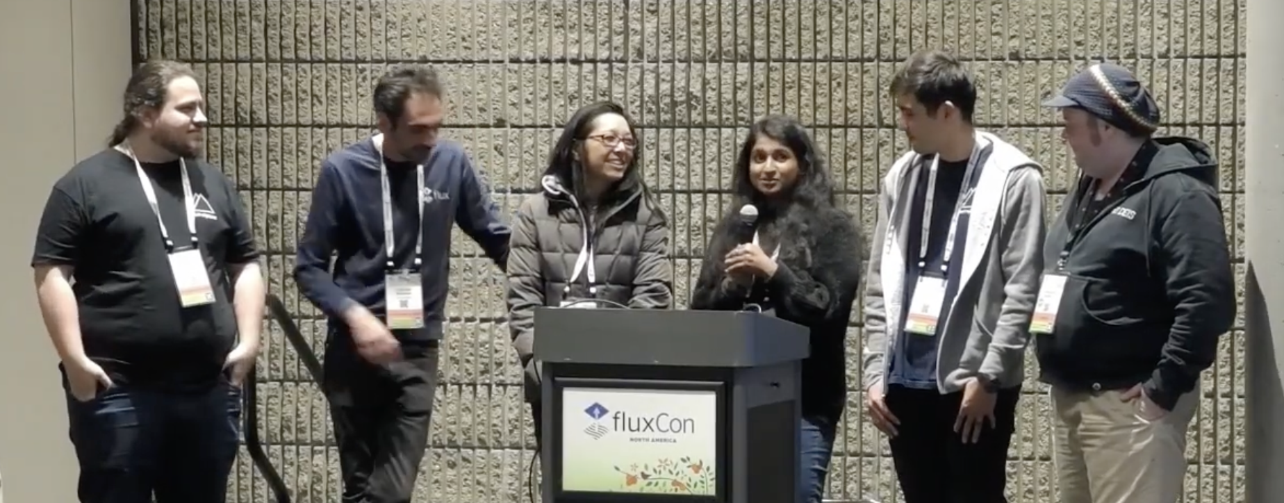 6 Flux Maintainers on-stage at the very first FluxCon: Matheus, Stefan, Tamao, Pinky, Leigh, Kingdon